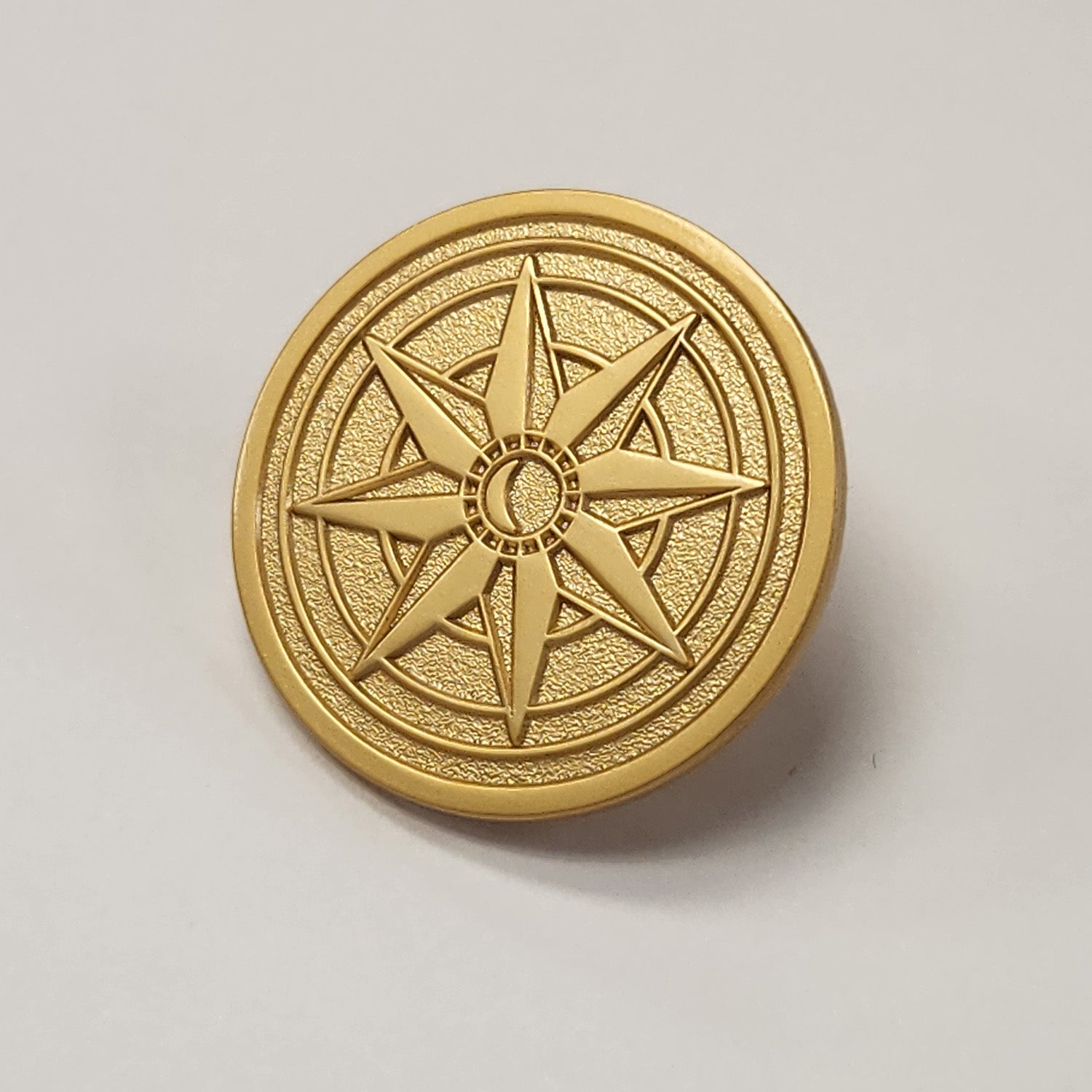 The Traitors Round Table Gold Pin Badge - Live (Click and Collect only) - Traitors Store